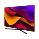 Arçelik A55 C 985 B Ultra HD 4K LED TV, renkli ekranı ve siyah çerçevesiyle kapalı fonda duruyor