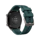 Huawei Watch GT Active 46.5 mm titanyum akıllı saatin sensörleri ve yeşil kordonu arkadan görünür.