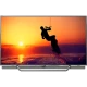 Philips 55PUS8602 Ultra HD 4K LED televizyon; gün batımı sahnesi ekranda, siyah standlı genel vitrin görünümü