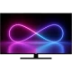 Vestel 65Q9900 Ultra HD 4K QLED televizyon, siyah çerçeveli ekranı ve renkli sonsuzluk deseniyle