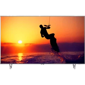 Philips 65PUS8102 Ultra HD 4K LED televizyon, gün batımı sahneli ekranda canlı görüntü sunar.