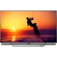 Philips 65PUS8602 Ultra HD 4K LED televizyon; gün batımı manzaralı ekranda, şık siyah tasarım.