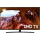 Samsung 50RU7400 Ultra HD 4K LED televizyon; vitrinde gösterilen düz ekran ve UHD TV yazısı.