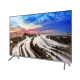 Samsung 75MU7000 Ultra HD 4K LED televizyon ekranda gün batımı manzarası, genel renkli TV standında