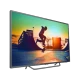 Philips 65PUS6262 Ultra HD 4K LED televizyon; ekranda gün batımı sahnesi ve şehir manzarası görünüyor.
