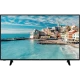 SEG 55SBU710 Ultra HD 4K LED televizyon, sahil manzarası gösteren siyah ekranı ve ayaklarıyla önden görünüm
