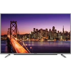 Grundig 65 VLX 7730 SP Ultra HD 4K LED TV, köprü ve şehir manzarası gösteren geniş ekranlı televizyon
