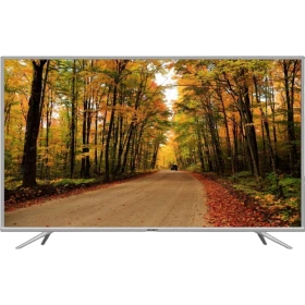 Axen AX65LEDA71-TNR Ultra HD 4K LED televizyon, sonbahar ormanı manzarası gösteren ince ekran tasarımı
