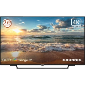 Grundig Madrid 55 GJQ 9250 Ultra HD 4K LED televizyon, siyah çerçeveli ve sahil manzaralı ekranıyla önden görünüm