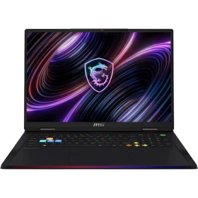 MSI Raider 18 Max HX A2WJ-1059TR siyah oyuncu laptop; RGB aydınlatmalı klavye ve renkli ekran arka planı.