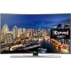 Samsung 78JU7500 Ultra HD 4K LED TV, şehir manzaralı ekranı ile ön panel görünümü, genel renk