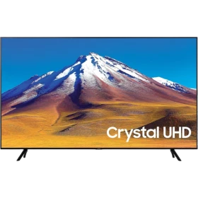 Samsung 65TU7092 Ultra HD 4K LED televizyon; ekranda Crystal UHD yazısı ve dağ manzarası görünüyor.