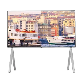 Vestel 65UA9650 Ultra HD 4K LED televizyon, şehir ve vapur manzarası gösteren ekranıyla beyaz ayaklı tasarım