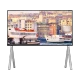 Vestel 65UA9650 Ultra HD 4K LED televizyon, şehir ve vapur manzarası gösteren ekranıyla beyaz ayaklı tasarım