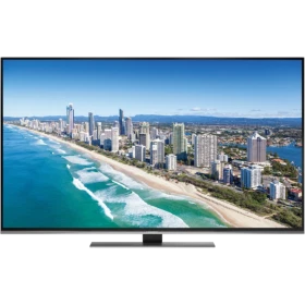 Grundig 49 VLX 9600 SP Ultra HD 4K LED televizyon, sahil kenti manzarasını gösteren ekranıyla