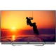 Philips 65PUS8602 Ultra HD 4K LED televizyon; gün batımı sahnesinde dalga üstünde tek siluet görüntüsü