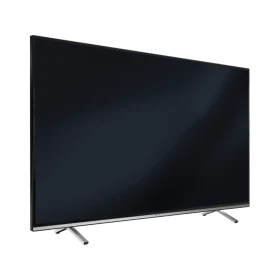 Grundig New York 49 CLX 8670 BP Ultra HD 4K LED televizyon, siyah ekranlı ve gümüş ayaklı.