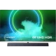 Philips 65PUS9435 LED Ultra HD 4K TV ekranında Ambilight ve 4K UHD HDR ışıkları görünüyor.