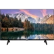 Vestel 43F9600 Full HD LED TV, siyah çerçeveli televizyon ve ayaklarıyla manzara görüntüsü gösteriyor