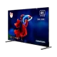Grundig 65 GQ 650 Ultra HD 4K TV, siyah çerçeveli ekranda renkli beta balığı görüntüsüyle, ayaklı tasarım.