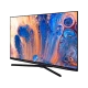 Beko Crystal Pro x B55 C 985 BE Ultra HD 4K TV, siyah çerçeveli ekran ve renkli soyut yayın görüntüsü