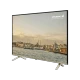 Grundig 58 GEU 8910 B Ultra HD 4K LED televizyon, şehir manzarası gösteren ince çerçeveli ekran