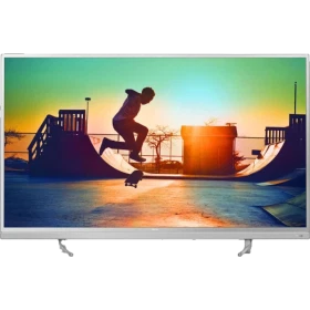 Philips 49PUS7002 Ultra HD 4K LED TV; ekranda gün batımı sahnesi ve skateboard figürü görünüyor