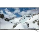 Grundig Toronto 40 GEF 6965 B Full HD LED TV, karlı dağ manzarası gösteren ince ekranlı televizyon
