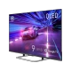 Arçelik A 975 C AI Ultra HD 4K QLED televizyon, siyah ekranında yarış otomobili ve gümüş ayaklarla gösteriliyor