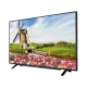 Grundig 43 VLE 5830 BN Full HD LED televizyon, yel değirmeni ve çiçekli kır manzarasını ekranda gösteriyor
