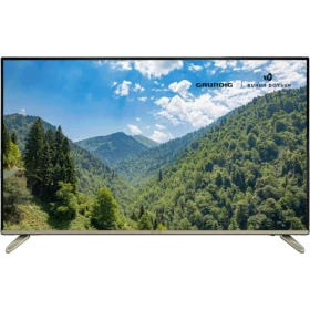 Grundig 50 GCU 8900B Ultra HD 4K LED televizyon, siyah çerçeveli ve ayaklı tasarım, dağ manzarası ekranı