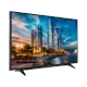 Grundig 49 VLX 7810 BP Ultra HD 4K LED televizyon, şehir manzarası gösteren siyah ekranıyla.
