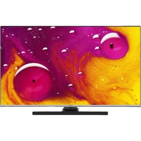 Vestel 43Q9700TT Ultra HD 4K QLED televizyon, siyah çerçevesiyle renkli soyut görüntü gösteriyor