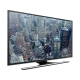 Samsung 40JU6470 Ultra HD 4K TV siyah çerçeveli, şehir manzaralı ekranda canlı görüntü ile gösteriliyor