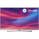 Philips 43PUS7354 Ultra HD 4K LED televizyon, siyah zeminli ekranda canlı renkli arka plan görüntüsü