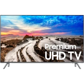 Samsung 82MU8000 Ultra HD 4K LED televizyon; plaj manzarası ekranda, vitrinde şık siyah tasarım.
