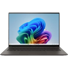 Asus Zenbook S14 OLED UX5406SA-PZ287W koyu gri ultrabook laptop açık ekranda renkli tasarım görünüyor