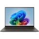 Asus Zenbook S14 OLED UX5406SA-PZ287W koyu gri ultrabook laptop açık ekranda renkli tasarım görünüyor