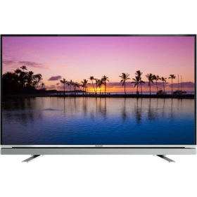 Arçelik A55L 6652 5B Full HD LED TV, gün batımı manzarası gösteren ince çerçeveli televizyon