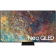 Samsung 85QN90A Ultra HD 4K QLED TV ekranında Neo QLED yazısı ve renkli görüntü, vitrin görünümü