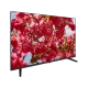 Grundig 40 GEF 6930 A Full HD LED televizyon, siyah çerçeveli ekranında kırmızı çiçekler gösteriliyor.