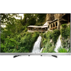 Beko B55-US-9498 Ultra HD 4K TV, doğa manzarası gösteren ince çerçeveli televizyon