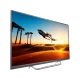 Philips 65PUS7502 Ultra HD 4K LED televizyon ekranında motorlu araç ve gün batımı sahnesi, genel renkli.
