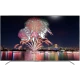 Arçelik A65 OLED 9795 5S Ultra HD 4K TV, gece manzarasında havai fişek gösterisi gösteriyor