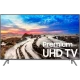 Samsung 65MU8000 Ultra HD 4K LED TV vitrin ekranında premium UHD TV manzarası ve yazı görünüyor