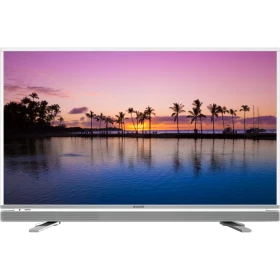 Arçelik A49L 6750 5W Full HD LED televizyon, gün batımı ve palmiye manzarası gösteren ekranıyla