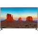 LG 55UK6500PLA Ultra HD 4K LED televizyon, önünde dağ manzarası ekranda duran vitrin görünümü