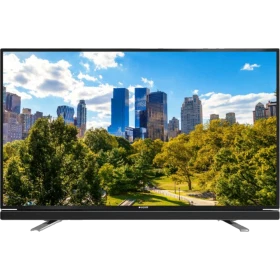 Arçelik A49L 6532 4B2 Full HD LED televizyon, siyah çerçeveli ekranıyla şehir manzarası gösteriyor
