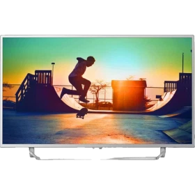 Philips 55PUS6412 Ultra HD 4K LED televizyon; kentsel manzara sahnesi ekranda, siyah çerçeve ve ayaklı tasarım.