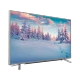 Beko B40L 8752 5S Ultra HD 4K TV, karlı orman manzarası gösteren metalik televizyon